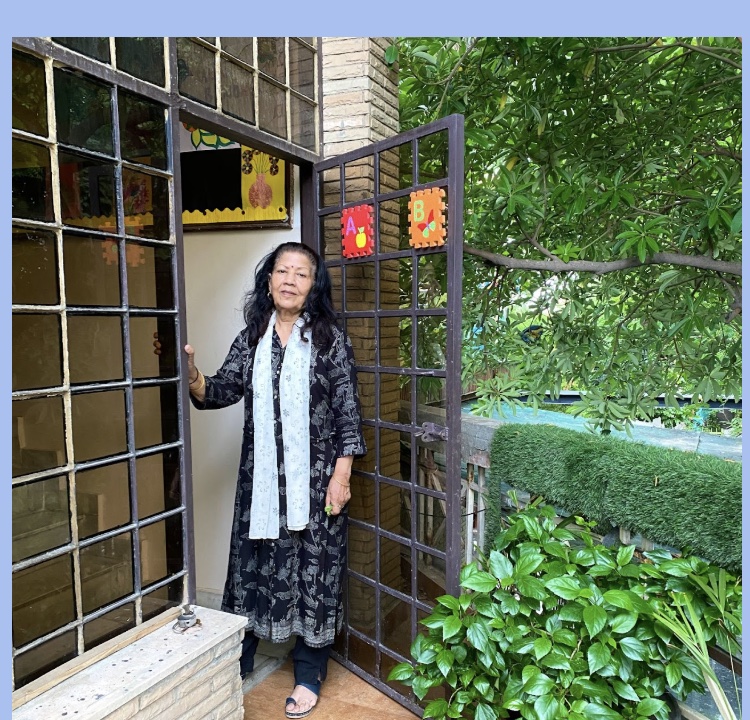 Mrs. Vimal Saxena at the school entrance